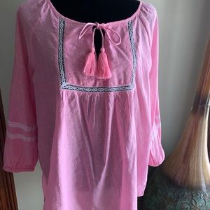 Pink shirt with tiny white pinstripes and dots.